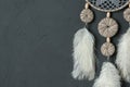 Gray white dream catcher on dark gray Royalty Free Stock Photo