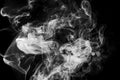 Gray, white smoke in the dark on a black background, isolated steam, fume, dry ice Royalty Free Stock Photo