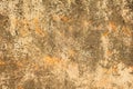 Gray white yellow old battered concrete wall with orange spots, deep scratches and stains of moss and mold. rough surface texture Royalty Free Stock Photo