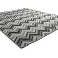 Gray and White Zigzag Patterned Area Rug on White Background carpet chevron Royalty Free Stock Photo
