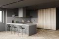 Gray and wood kitchen corner with bar Royalty Free Stock Photo