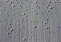 Gray wood surface with water droplets on Royalty Free Stock Photo