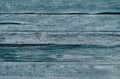 Gray wood texture with traces of cracked aquamarine paint.Abstract background blank template. rustic weathered wood barn Royalty Free Stock Photo