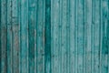 Gray wood texture with traces of cracked aquamarine paint.Abstract background blank template. rustic weathered wood barn Royalty Free Stock Photo