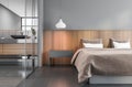 Gray and wooden bedroom and bathroom Royalty Free Stock Photo