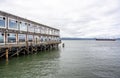 Building on wooden stilts in Astoria at the mouth of the Columbia River in the Pacific Ocean Royalty Free Stock Photo