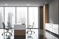 Gray and wooden CEO office, side view Royalty Free Stock Photo