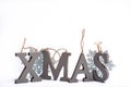 Gray wooden decorative letters X M A S with snowflakes copy space isolated white background, Christmas holidays postcard concept Royalty Free Stock Photo