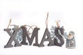 Gray wooden decorative letters X M A S with snowflakes copy space isolated white background, Christmas holidays postcard concept Royalty Free Stock Photo