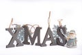 Gray wooden decorative letters X M A S with snowflakes copy space isolated white background, Christmas holidays postcard concept Royalty Free Stock Photo