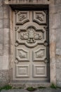 Amazing classic gray wooden door with decorative details. Front view