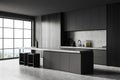 Gray and wooden kitchen corner with bar Royalty Free Stock Photo