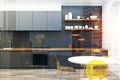 Gray wooden kitchen, yellow chairs toned Royalty Free Stock Photo