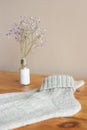 Gray woolen knitted socks on wooden table Royalty Free Stock Photo