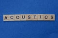 Gray word acoustics from small wooden letters