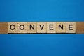 Gray word convene in small square wooden letters Royalty Free Stock Photo