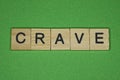 Gray word crave from small wooden letters