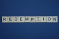 gray word redemption from small wooden letters