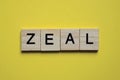 The gray word zeal of gray small wooden letters