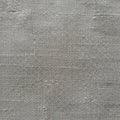 Gray woven fabric with a plain weave texture, featuring closely interlaced horizontal and vertical Royalty Free Stock Photo