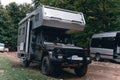 Gray 4x4 van off-roading. vehicle has been converted into a mobile home, van, motorhome, camper. Travel and adventure