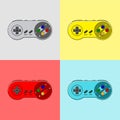 set of multicolored retro gamepads