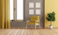 Gray and yellow room with armchair on hardwood floor