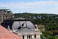 Gray zink metal mansard roof on historic building in Budapest