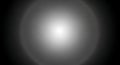 Abstract grayscale image with a central bright circular light Royalty Free Stock Photo