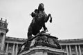 Grayscale closeup of Equestrian sculpture on square in front of Austrian National Library in Vienna