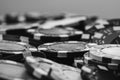 Grayscale closeup of a pile of poker chips on the table Royalty Free Stock Photo