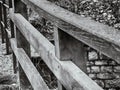 Grayscale closeup shot of an old wooden fence