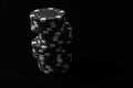 Grayscale closeup shot of a stack of poker chips