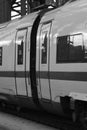 Grayscale closeup of the wagon and the door of a German express train in Cologne, Germany