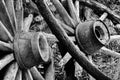 Grayscale closeup of weathered vintage wooden wagon wheels Royalty Free Stock Photo