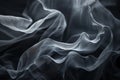 A grayscale image of smoke or flowing silk. AIG51A