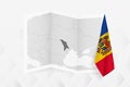 A grayscale map of Moldova with a hanging Moldovan flag on one side. Vector map for many types of news