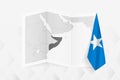 A grayscale map of Somalia with a hanging Somali flag on one side. Vector map for many types of news