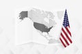 A grayscale map of USA with a hanging American flag on one side. Vector map for many types of news