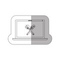 Grayscale middle shadow sticker with laptop with crossed wrenches in display