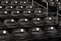 Grayscale of numbered seats in a stadium