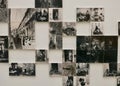 Grayscale photographs displayed on a white wall in Mouraria Lisbon