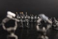 Grayscale selective focus shot of soldiers holding bows figurines Royalty Free Stock Photo