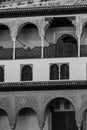 Grayscale shot of the architectural details of the Alhambra palace external view in Granada, Spain