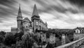 Grayscale shot of the Corvin Castle. Hunedoara, Romania Royalty Free Stock Photo