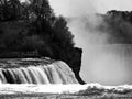 Grayscale shot of a dramatic waterfall Royalty Free Stock Photo