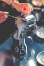 Grayscale shot of a female barista at work Royalty Free Stock Photo