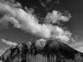 Grayscale shot of Mount Si from North Bend, Washington under a bright cloudy sky