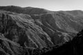 A grayscale shot of mountain landscape Royalty Free Stock Photo