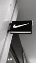 Grayscale shot of the Nike store logo in a shopping mall in Yerevan, Armenia